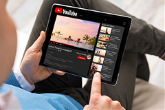 youtube-channel photo of YouTube being used on a tablet