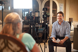 photo of an interview being video recorded